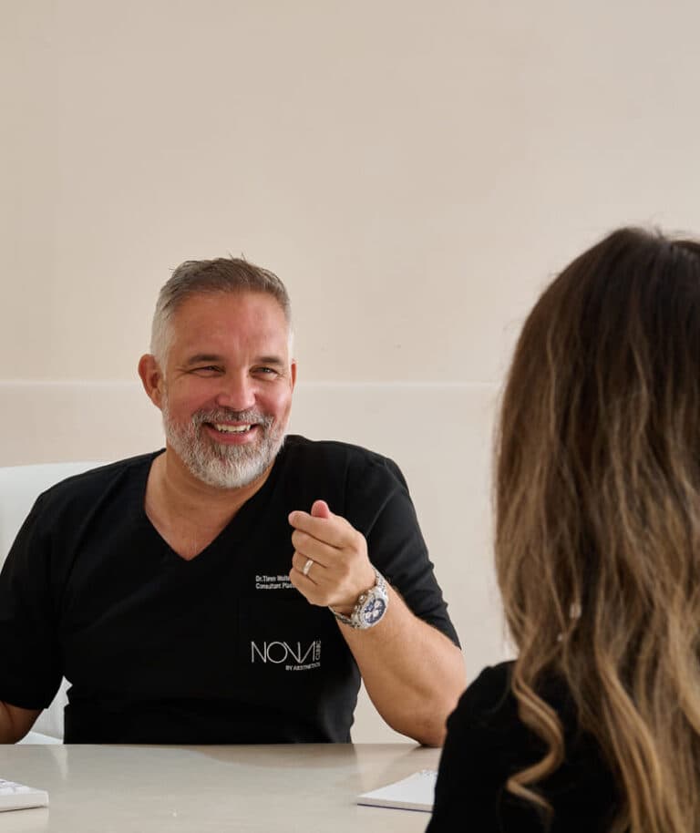 Doctor consulting with patient about aesthetic treatment